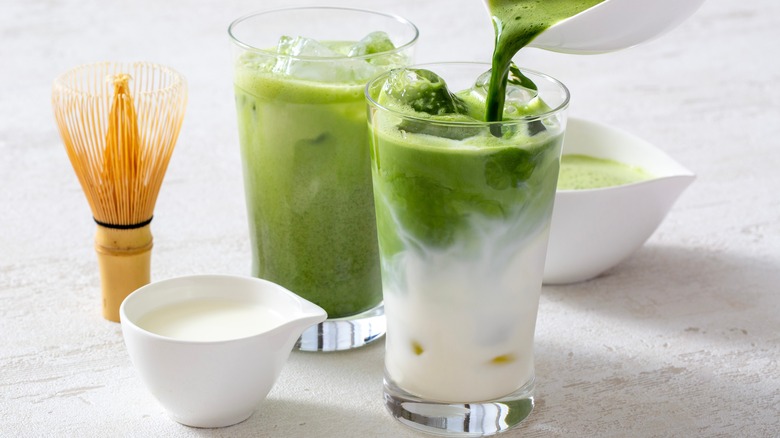 pouring matcha into glass