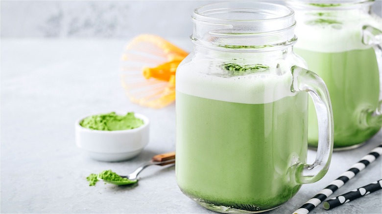 Matcha with milk in jars 