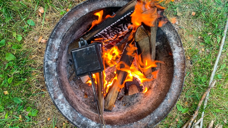 pie iron in a campfire