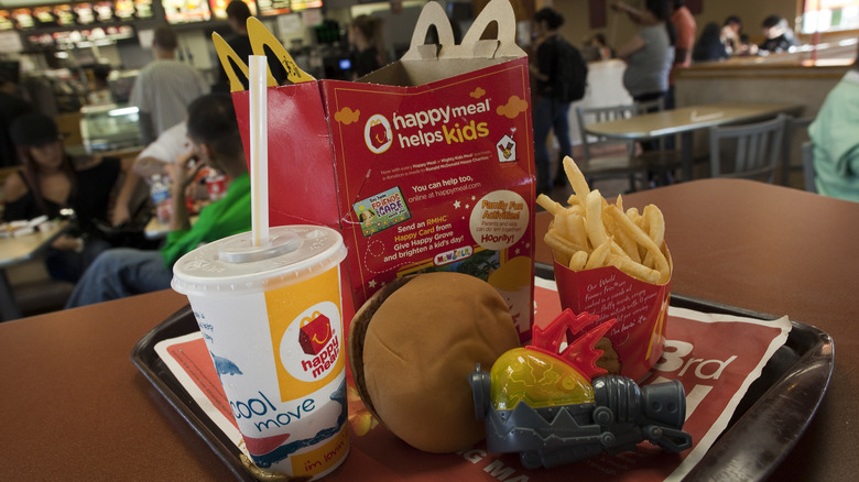 Happy Meal with fries, burger, drink, and toy