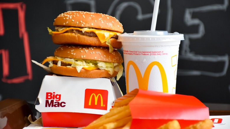 McDonald's cheeseburger, soda, french fries, and nuggets