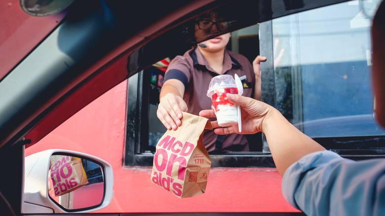 Grabbing food from the McDonald's drive thru