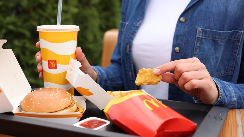 Person eating McDonald's meal