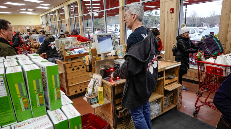 Trader Joe's employee at checkout line