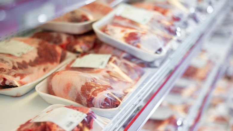 Packaged meat in a store case