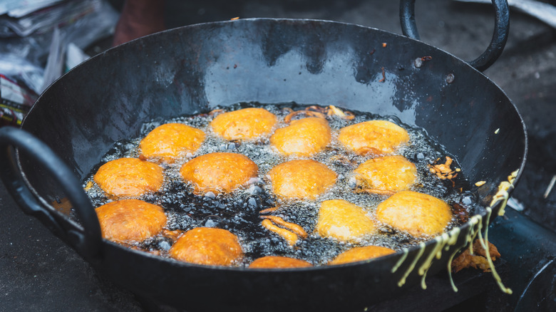 Potato chops shallow frying in kadai