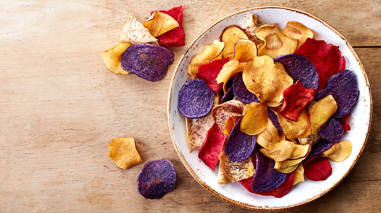 colorful veggie chips in white bowl