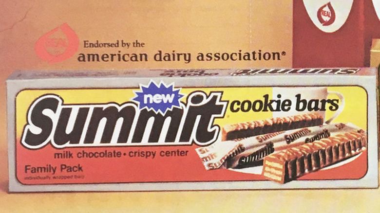 A Summit Candy Bar being constructed before coating in chocolate