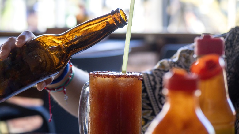 Michelada with beer bottle