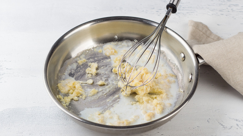 Making roux-based sauce in a sauté pan