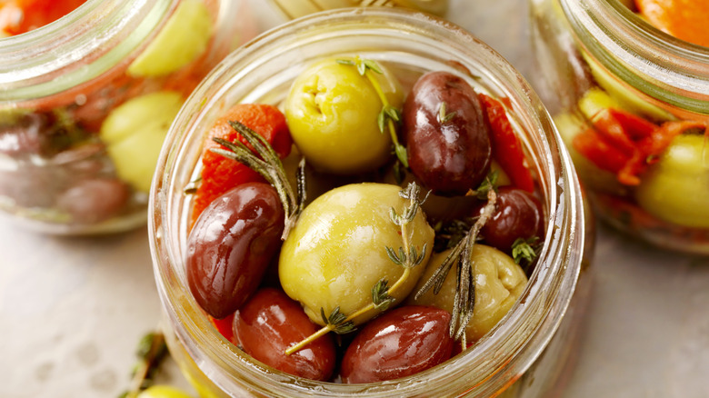 Jar of marinated olives