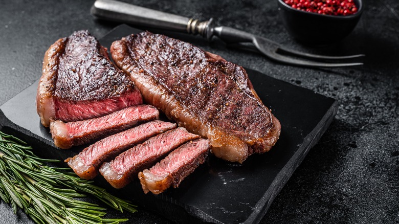 sliced and whole sirloin steak