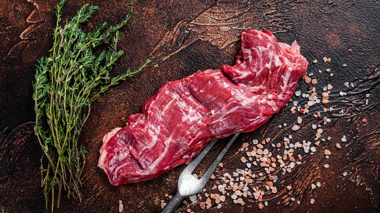 raw skirt steak with salt