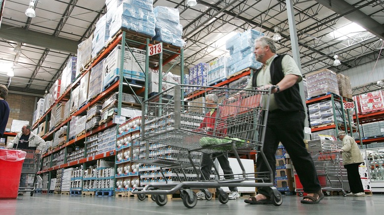 Guy pushing cart in Costco