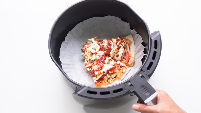 Pizza in air fryer basket