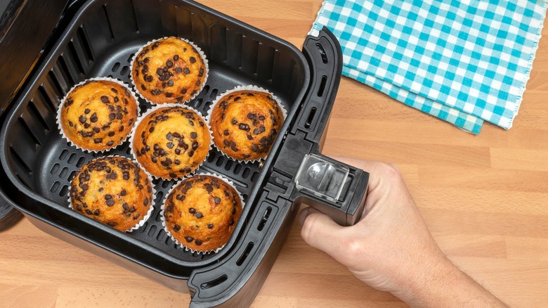 air fryer basket with muffins