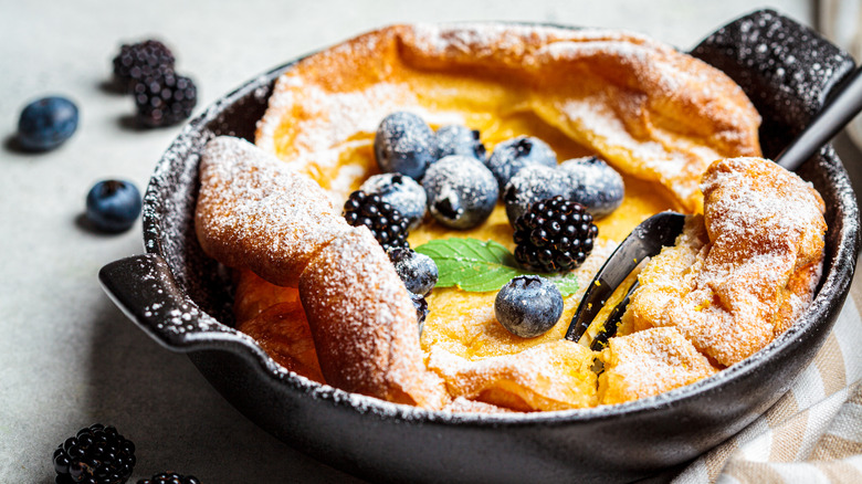 dutch baby pancake topped with berries