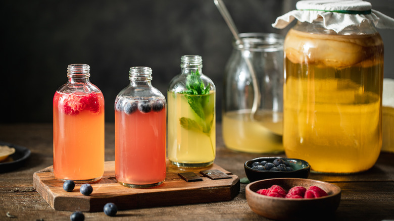 Kombucha in jars on table