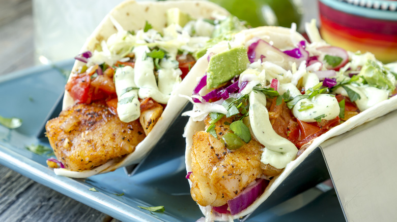 Fish tacos on blue plate