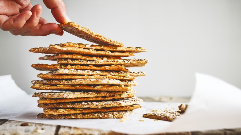 Stack of wholesome seeded crackers 