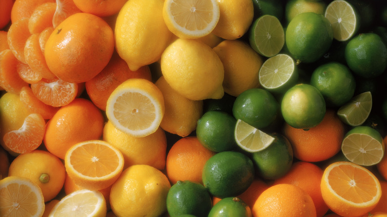 oranges lemons and limes in a pile