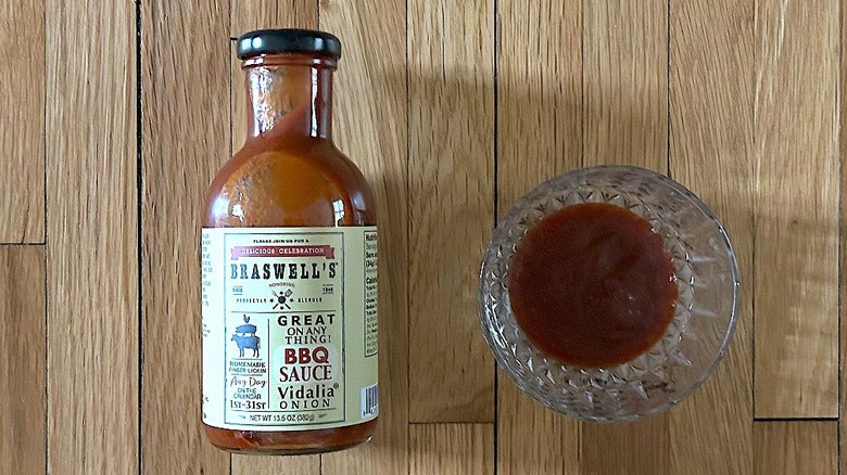 Bottle and glass bowl of Braswell Sauce Barbeque Vidalia Onion