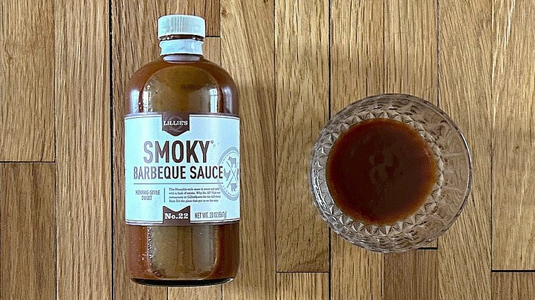 Bottle and glass bowl of Lillie's Q - Smoky Barbeque Sauce