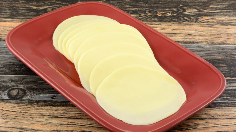 Slices of provolone cheese