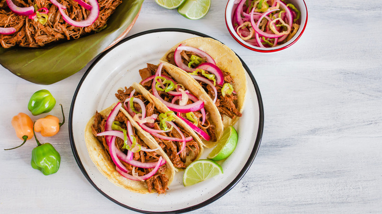 Cochinita pibil tacos on plate