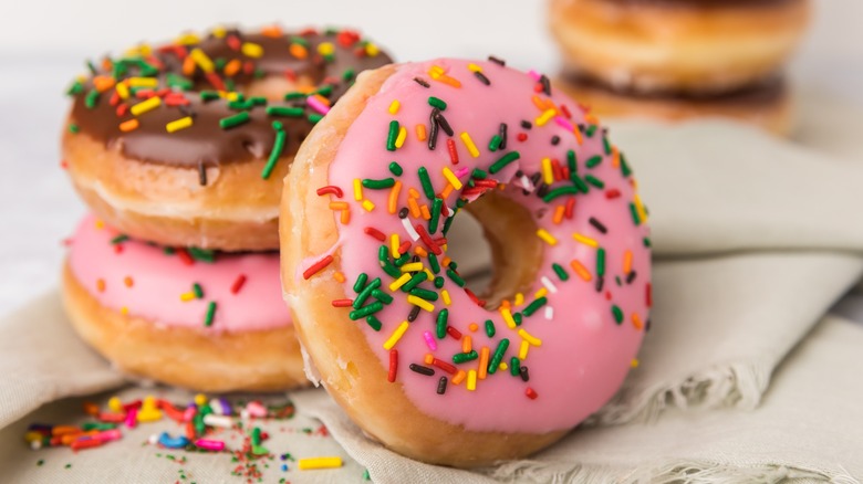 pink frosted donuts with sprinkles