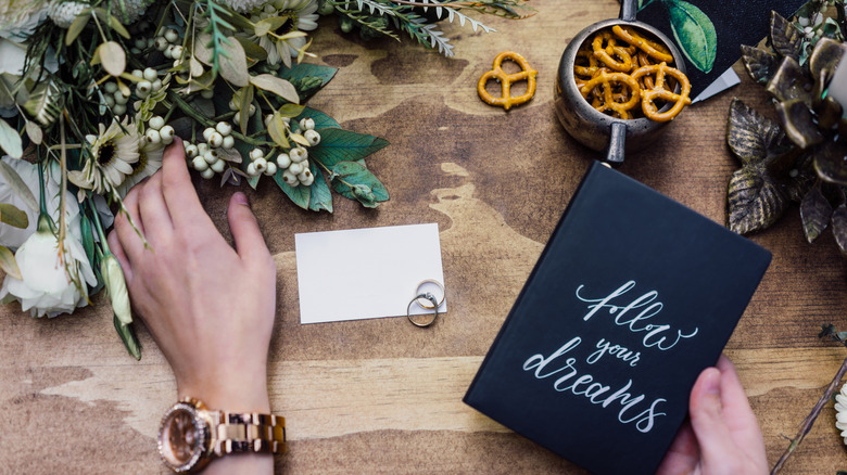 Wedding ring and invitation with pretzels 