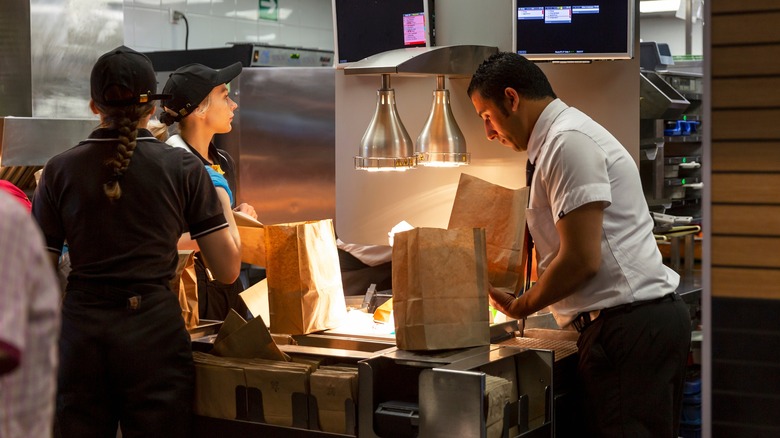 McDonald's staff working in kitchen