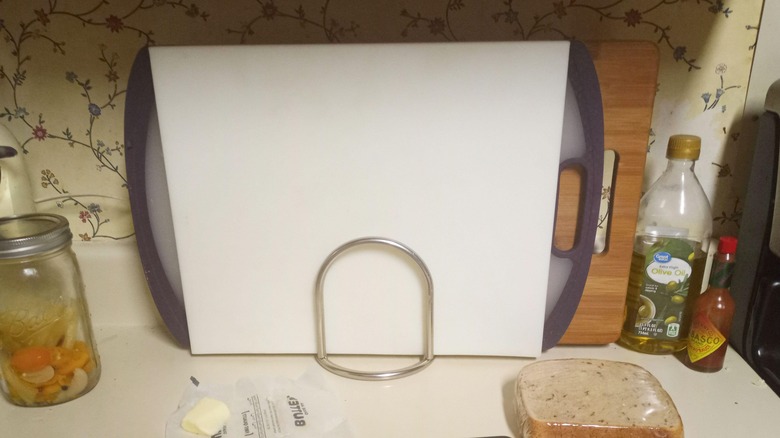 A napkin holder with cutting boards