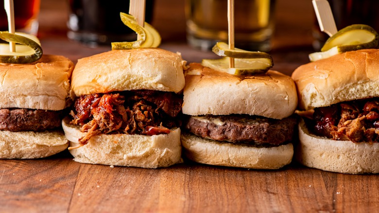 Sliders with pickles on a table 