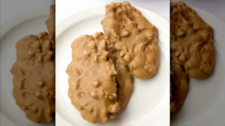 pecan praline on white plate