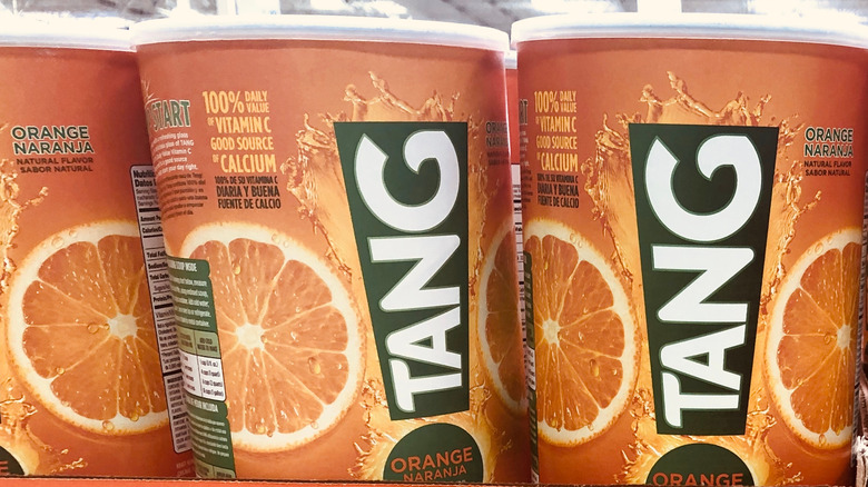 Tang container in box with groceries 