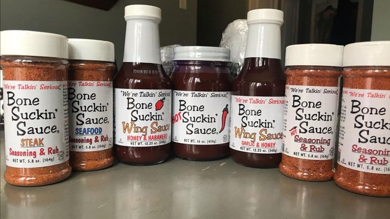 bottles of bone suckin' sauce on a counter