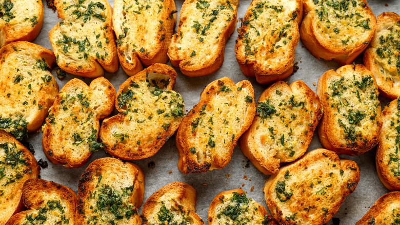 garlic bread spread with herbs