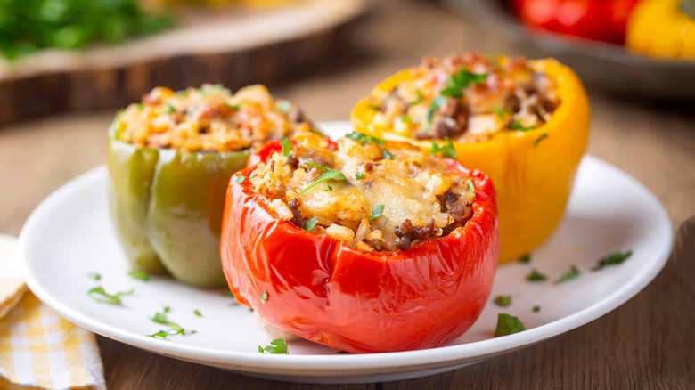 stuffed tricolor bell peppers on a plate