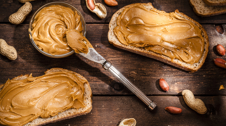 overhead artistic shot of homemade creamy peanut butter on toast