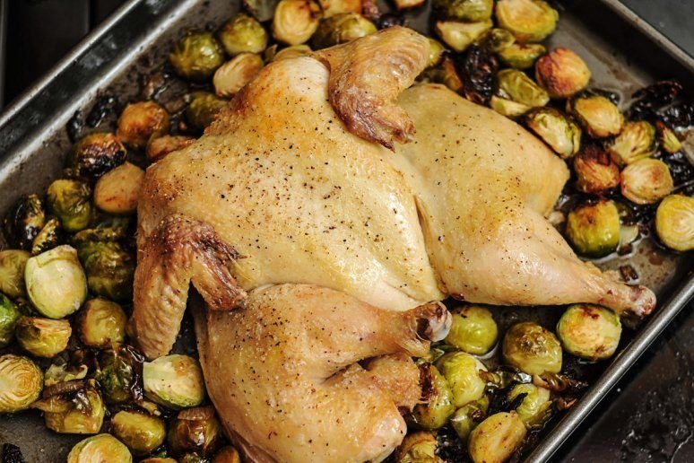 Roasted Chicken With Bacon-Glazed Brussels Sprouts and Caramelized Onions