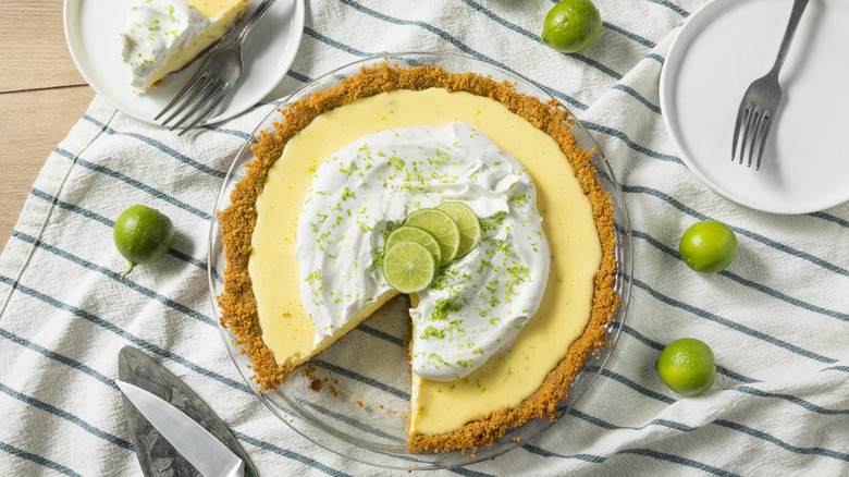 key lime pie with slice missing