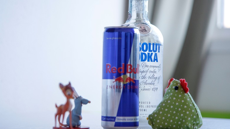 bottle of vodka with red bull