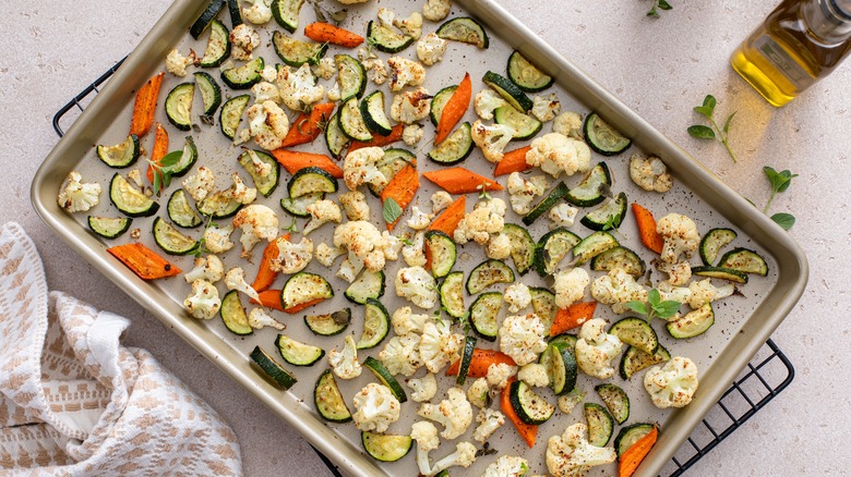 Roasted vegetables on baking sheet