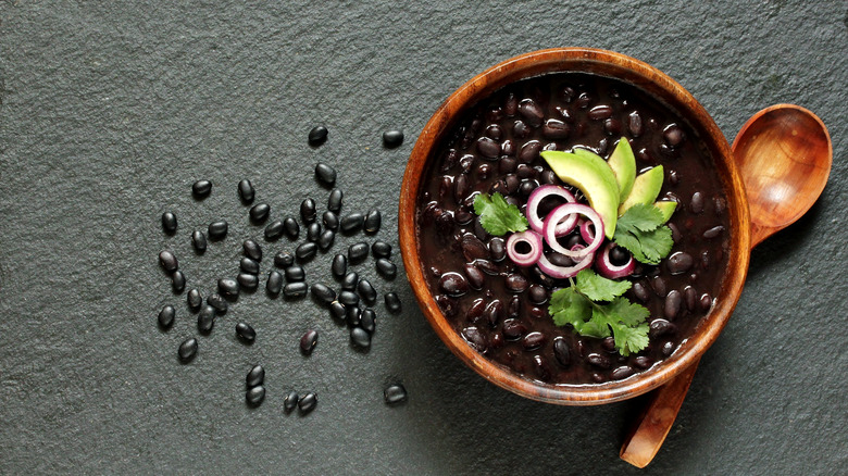 A bowl of black bean soup 