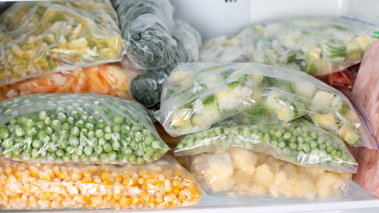 plastic bags of frozen vegetables