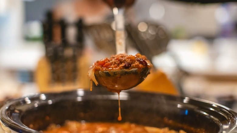 spoonful of chili from slow cooker