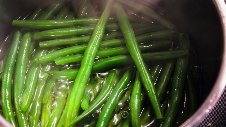 Green beans boiling in pot
