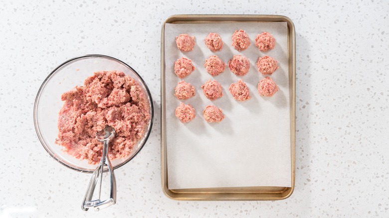 Making meatballs with cookie dough scoop