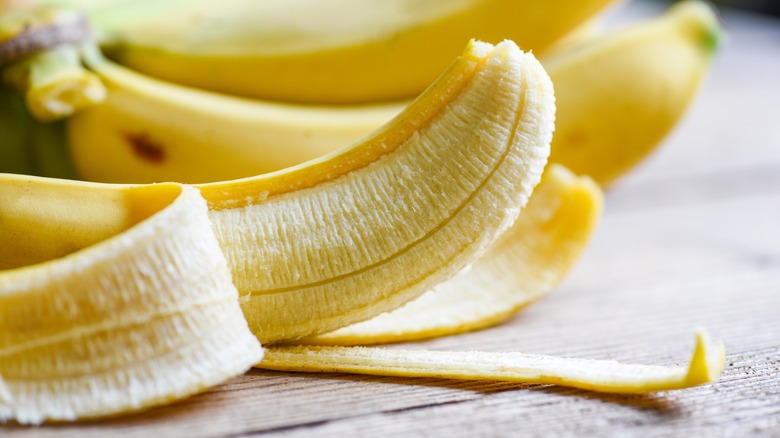 partially peeled banana